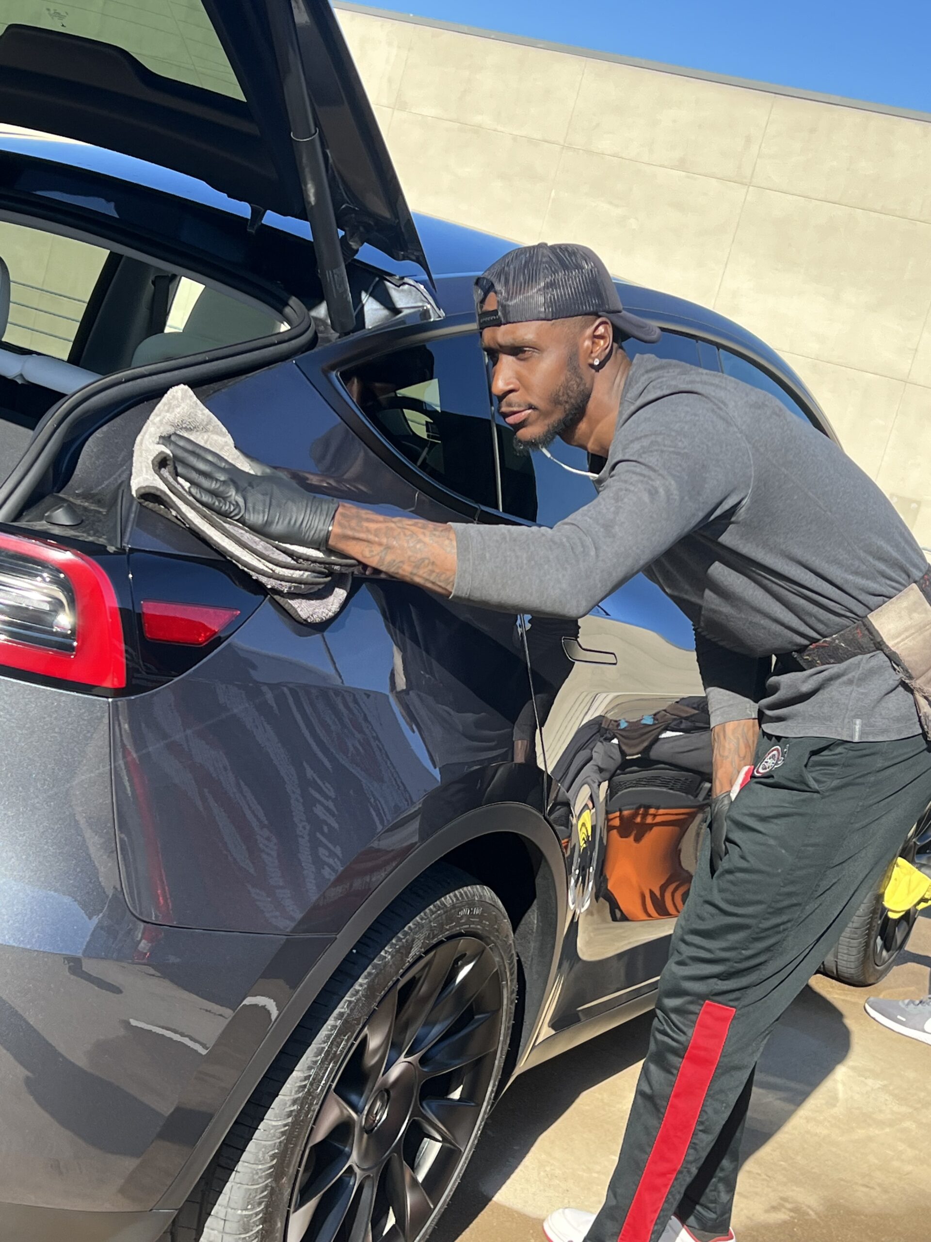 Ceramic coating application on a luxury automobile