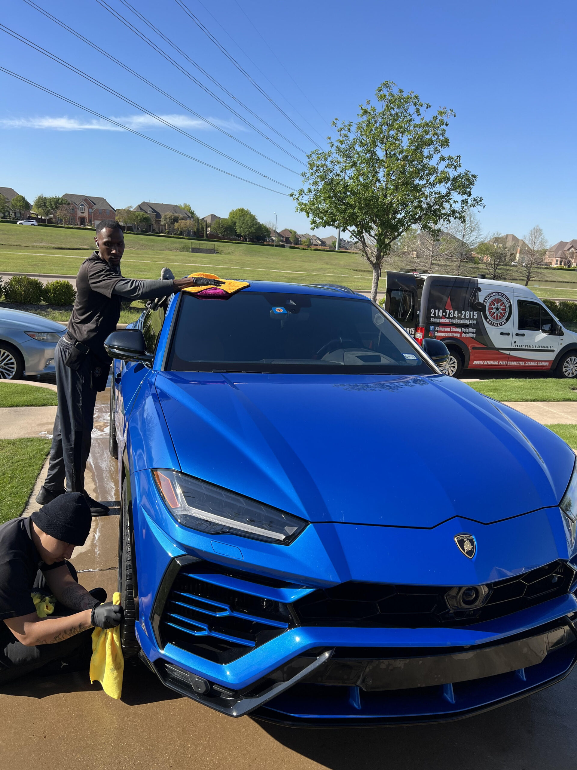 Sampson Strong Detailing team preparing a luxury automobile